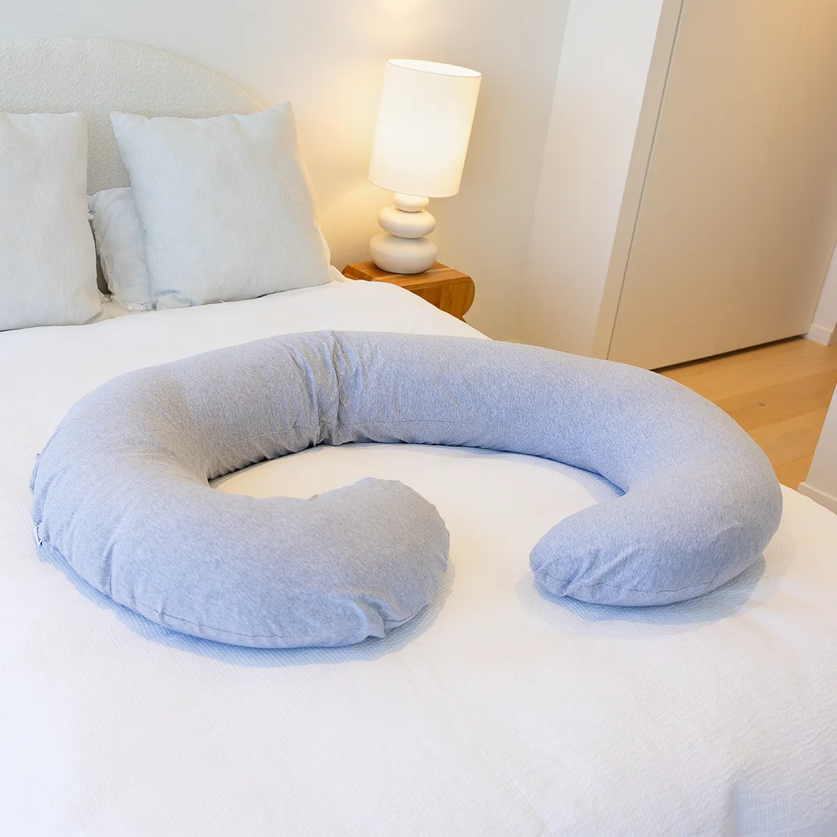 BodyCloud Pregnancy Pillow with grey cotton jersey cover on a double bed