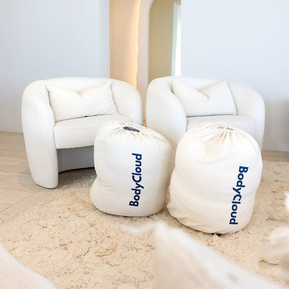 Image of Two BodyCloud Pregnancy Pillow Cotton Storage Bags with the Pregnancy Pillow inside, showcasing easy storage